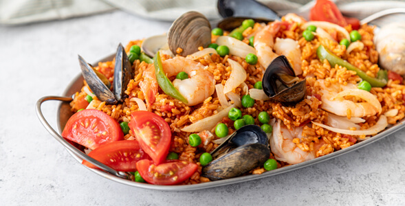 Coastal Spanish Paella on a white background