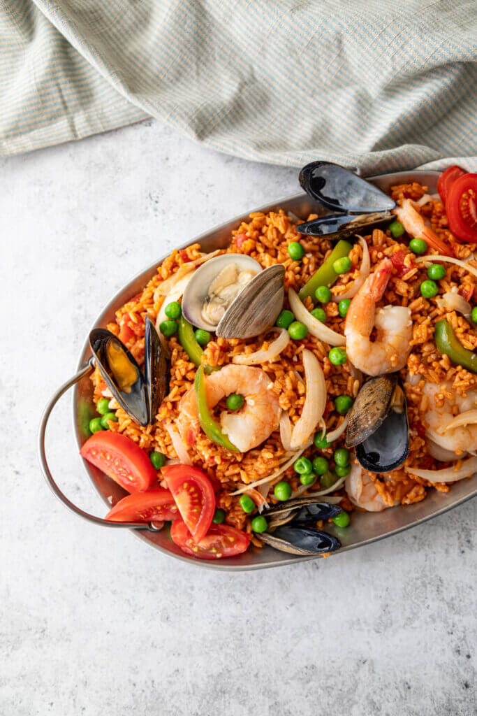 Coastal Spanish Paella on white background