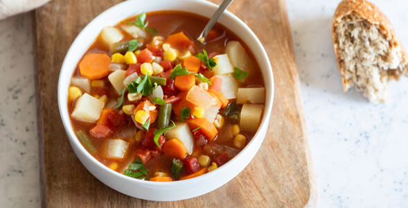 Gaden Vegetable Soup on Cutting board