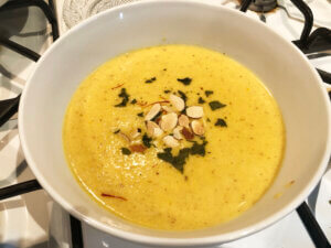 White bowl of Onion, Almond and Saffron Soup