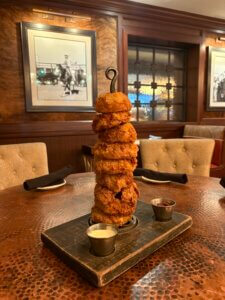 Onion rings arranged in a tower